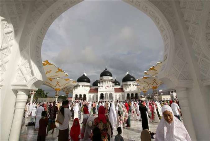 Indonesian Muslims gather in the Baiturrahman mosque in Banda Aceh, Aceh Province, in Indonesia.jpg