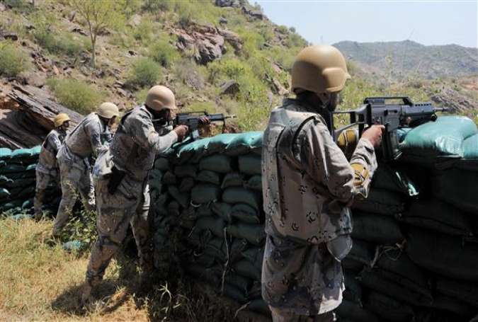 Saudi border guards keep watch along the frontier with Yemen in the al-Khubah area, Jizan Province.jpg