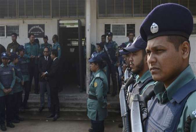 Bangladesh security personnel stand guard at a court where Bangladesh