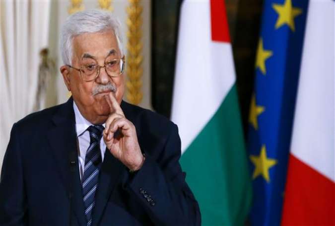 Palestinian President Mahmoud Abbas gestures as he speaks during a joint press conference with French president following their meeting at the Elysee Presidential Palace, in Paris, on December 22, 2017. (Photo by AFP)
