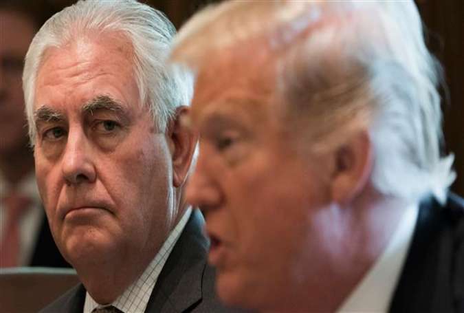 US President Donald Trump speaks alongside Secretary of State Rex Tillerson (L) during a Cabinet Meeting in the Cabinet Room of the White House in Washington, DC, October 16, 2017. (Photo by AFP)