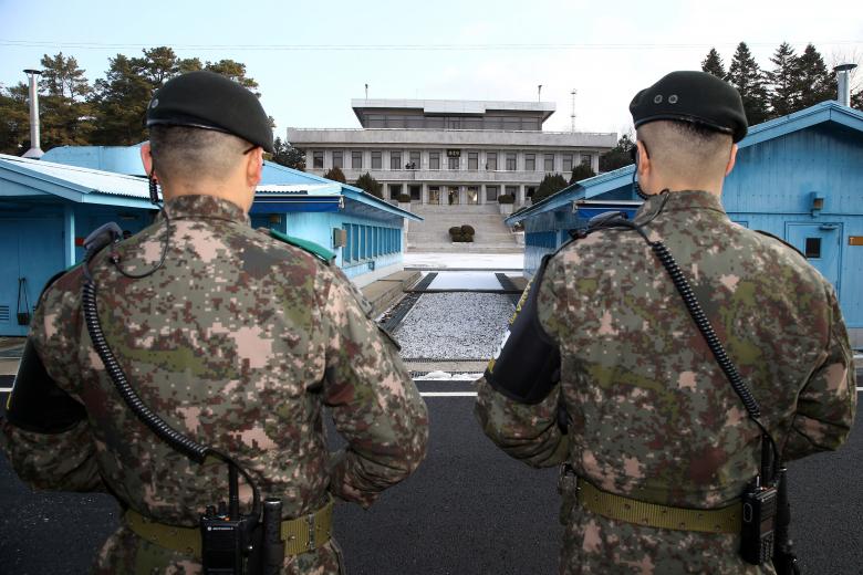 South Korean soldiers stand guard at the truce village of Panmunjom in the demilitarized zone separating the two Koreas, South Korea.