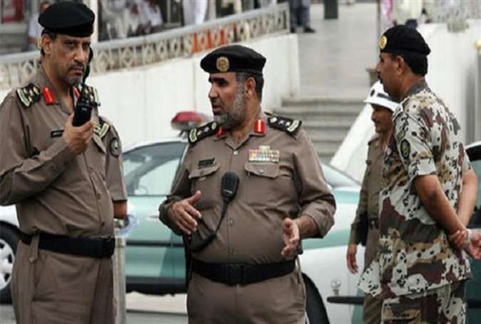 The file photo shows Saudi policemen