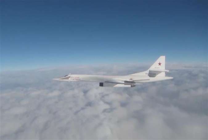 This video grab released by the UK Ministry of Defense shows a Russian Tu-160 bomber flying near British airspace over the North Sea.