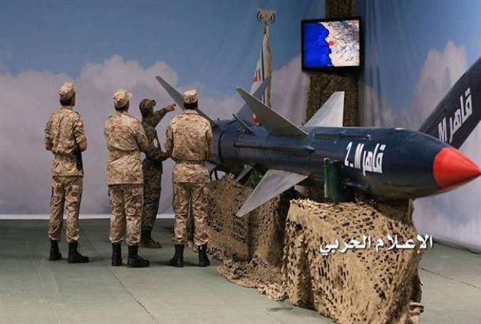 A frame grab from video provided by Yemen’s War Media outlet shows Yemeni military servicemen beside a Qaher M-2 missile.