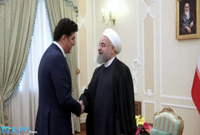 روحاني لبارزاني: إيران تدعم وحدة العراق