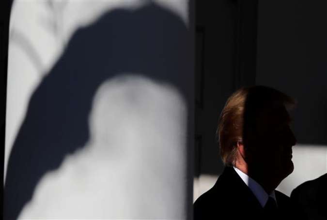 US President Donald Trump prepares to address the annual March for Life rally, taking place on the National Mall, from the White House Rose Garden in Washington, US, January 19, 2018. (Photo by AFP)