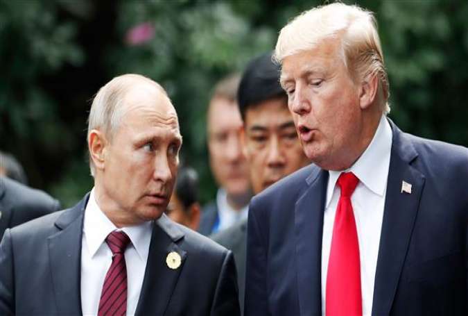 US President Donald Trump (R) and Russian President Vladimir Putin (File photo by AFP)