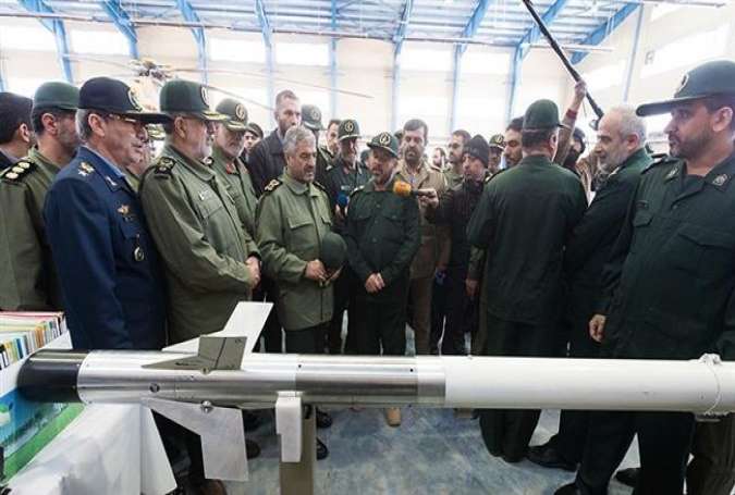 Major General Mohammad Ali Jafari (4th-L), the chief commander of Iran’s Islamic Revolution Guards Corps (IRGC), attends a ceremony to unveil the Azarakhsh anti-armor missile in Tehran on February 28, 2018. (Photo by Tasnim)