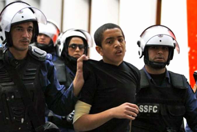 Bahraini regime forces arresting an activist