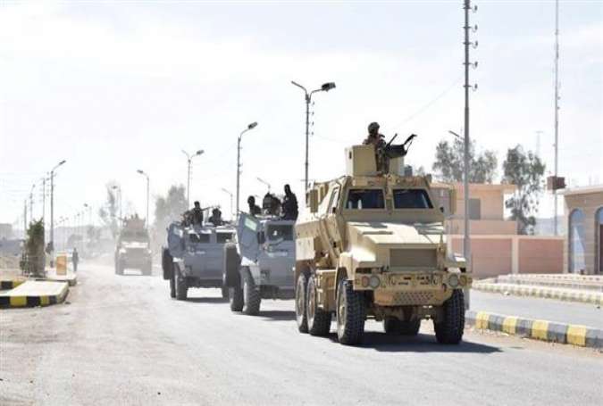 The handout picture provided by Egypt’s Defense Ministry on February 27, 2018 shows army and police vehicles in the city of Arish in the troubled northern part of the Sinai Peninsula during a major assault against militants. (Via Reuters)