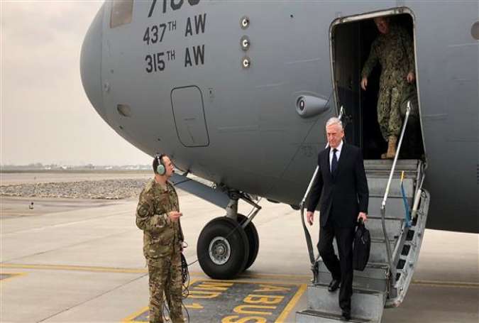 US Defense Secretary Jim Mattis disembarks from his plane on an unannounced trip to Kabul, Afghanistan, on March 13, 2018. (Photo by Reuters)