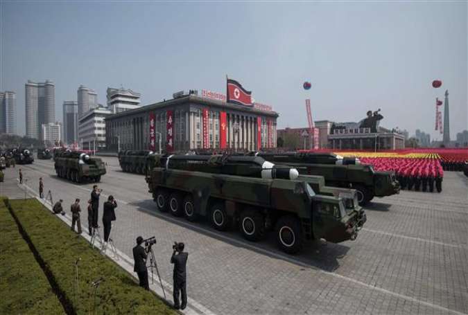 This file photo taken on April 15, 2017 shows an unidentified missile and mobile launcher making its way through Kim Il-Sung Square during a military parade marking the 105th anniversary of the birth of late North Korean leader Kim Il-Sung in Pyongyang. (Photo by AFP)