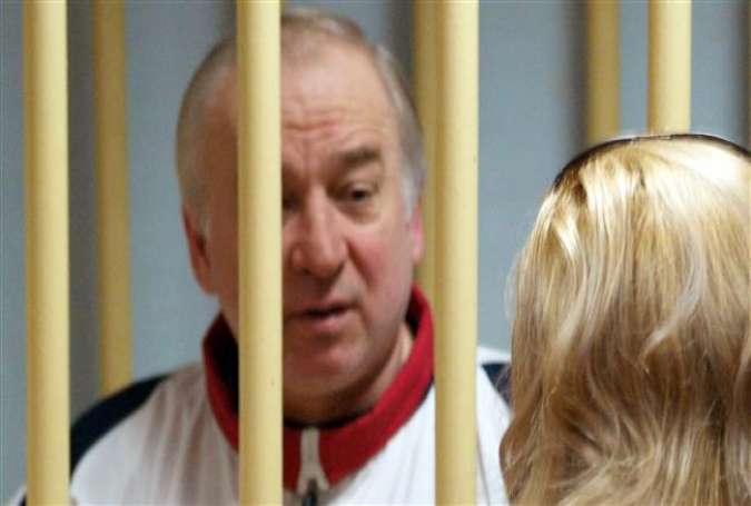 In this file photo taken on August 09, 2006, former Russian military intelligence colonel Sergei Skripal attends a hearing at the Moscow District Military Court in Moscow.(Photo by AFP)