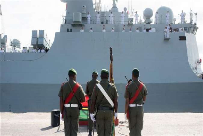 A Vanuatu Mobile Force honor guard stands in front of a People’s Liberation Army of China navy frigate on a four-day friendly visit to Vanuatu. (File photo)