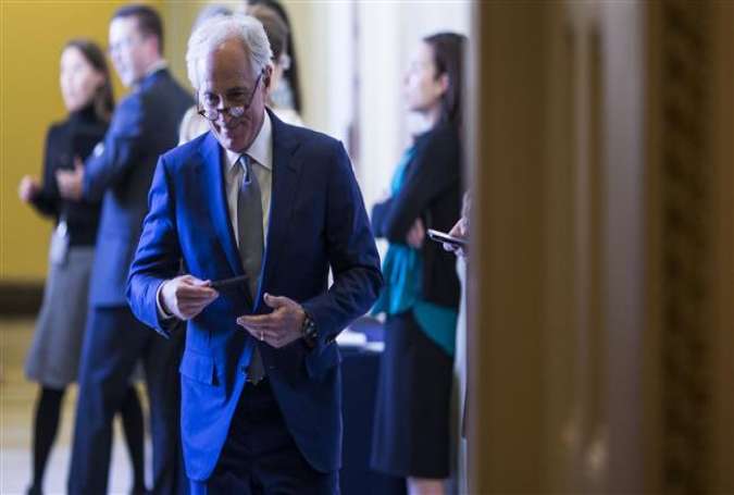 Sen. Bob Corker leaves a weekly policy luncheon with Republican lawmakers on Capitol Hill on April 10, 2018 in Washington, DC. (Photo by AFP)
