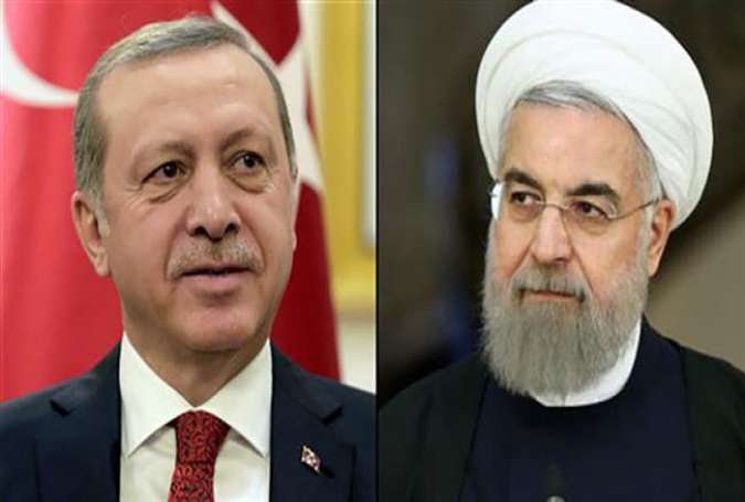 Iranian President Hassan Rouhani (R) and his Turkish counterpart Recep Tayyip Erdogan