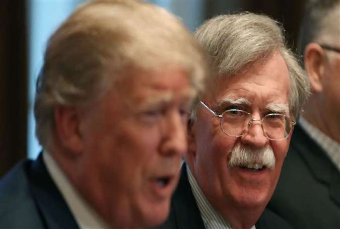 National Security Adviser John Bolton (R) and US President Donald Trump (file photo)