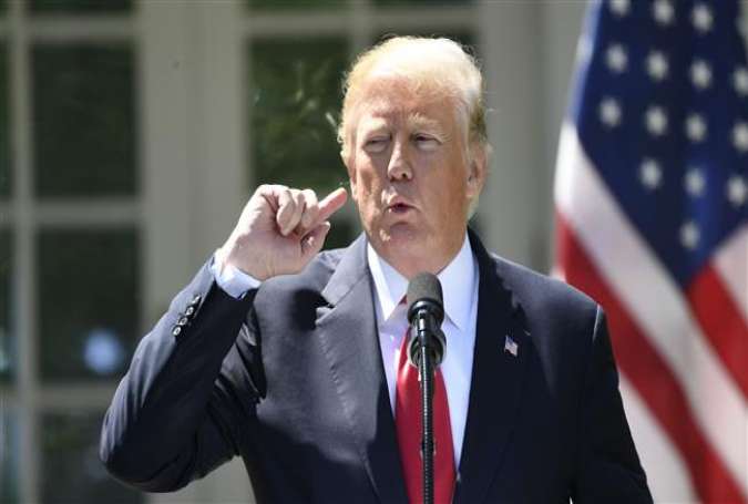 US President Donald Trump speaks during a joint press conference with Nigerian President Muhammadu Buhari in the Rose Garden of the White House on April 30, 2018, (Photo by AFP)