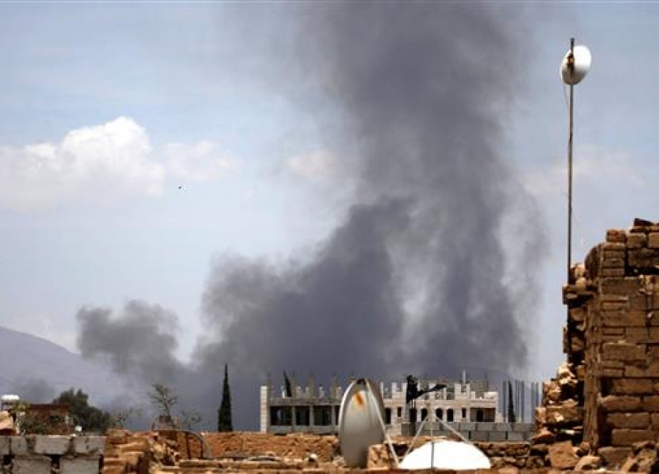 Smoke billows following a Saudi airstrike in the Yemeni capital, Sana