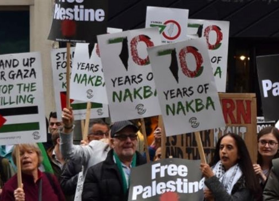 Demonstrators gather outside the embassy of Israel in Kensington.jpg