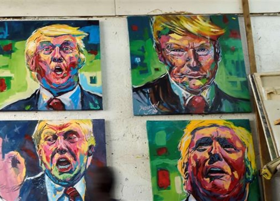 Paintings of US President Donald Trump by Kenyan artist Evans Yegon. (Photo by AFP)