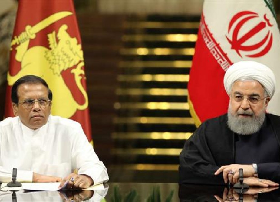 Iran’s President Hassan Rouhani (R) and his Sri Lankan counterpart Maithripala Sirisena hold a joint news conference in Tehran, May 13, 2018. (Photo by IRNA)