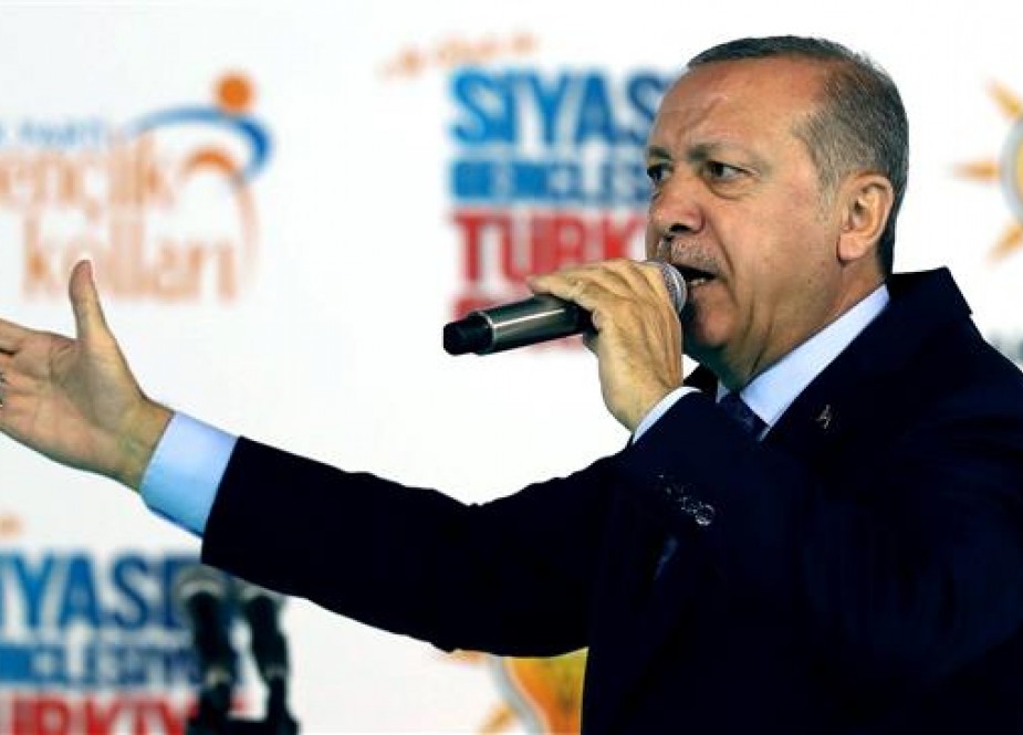 Turkish President Recep Tayyip Erdogan addresses a crowd during the congress of the ruling Justice and Development Party