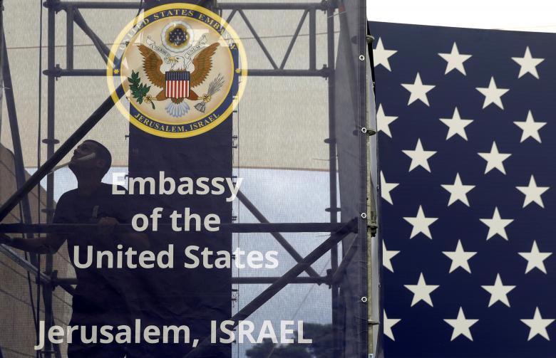 A worker is seen inside the new U.S. embassy compound during preparations for its opening ceremony.