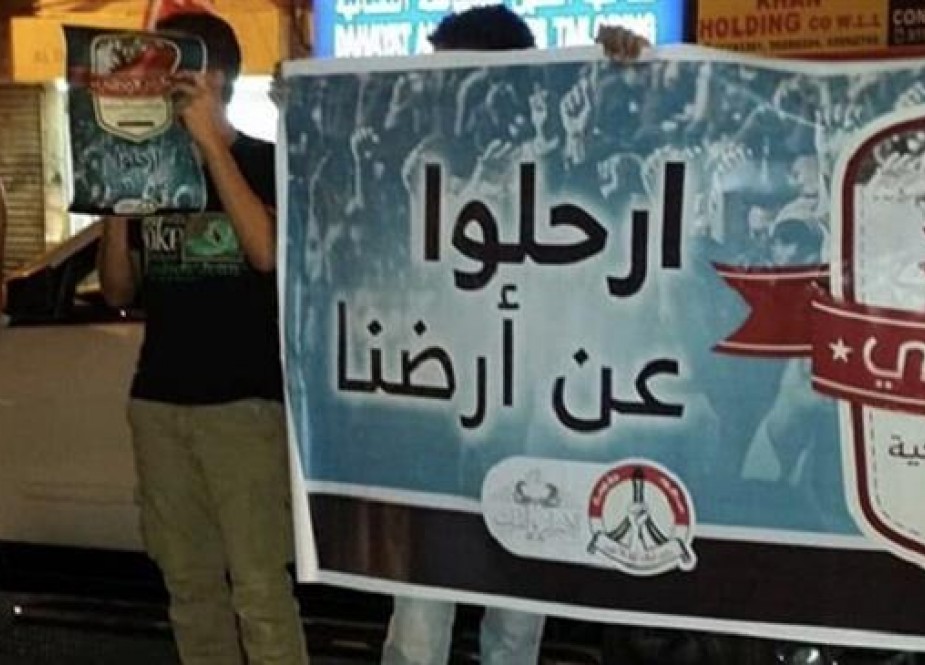 Protesters take part in a rally in the Bahraini capital Manama.jpg