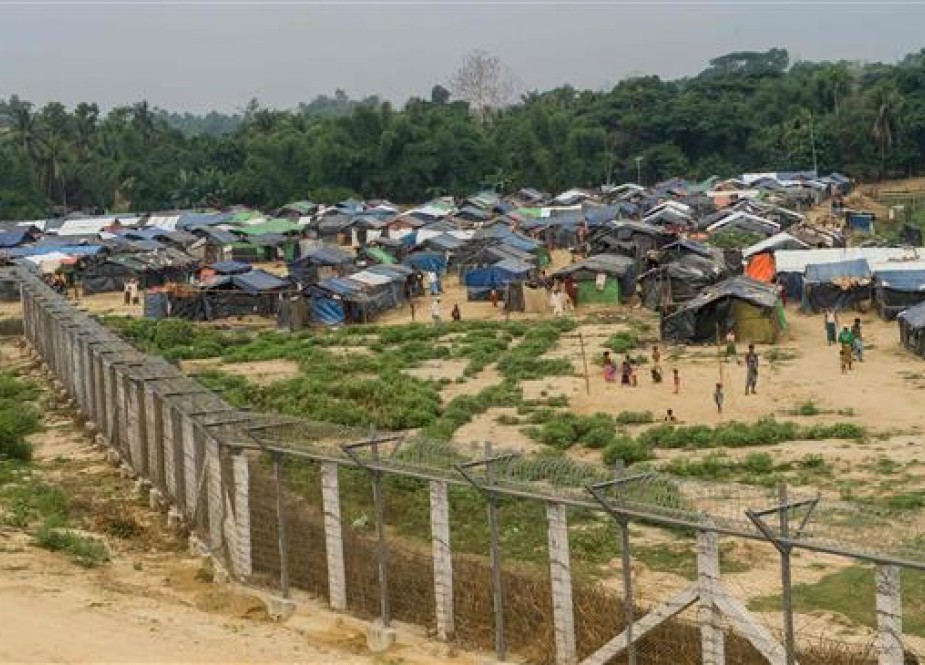 This picture, taken from Maungdaw District, in Myanmar’s Rakhine State, on April 25, 2018, shows Rohingya refugees at a temporary settlement setup in the no man’s land border zone between Myanmar and Bangladesh. (By AFP)