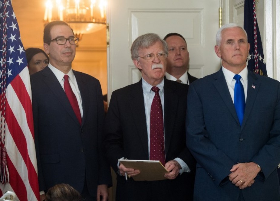 US Secretary of Treasury Steven Mnuchin (L), National Security Adviser John Bolton (C) and US Vice President Mike Pence listen as US President Donald Trump announces his decision about the nuclear deal with Iran during a speech from the Diplomatic Reception Room at the White House in Washington, DC, May 8, 2018. (Photo by AFP)