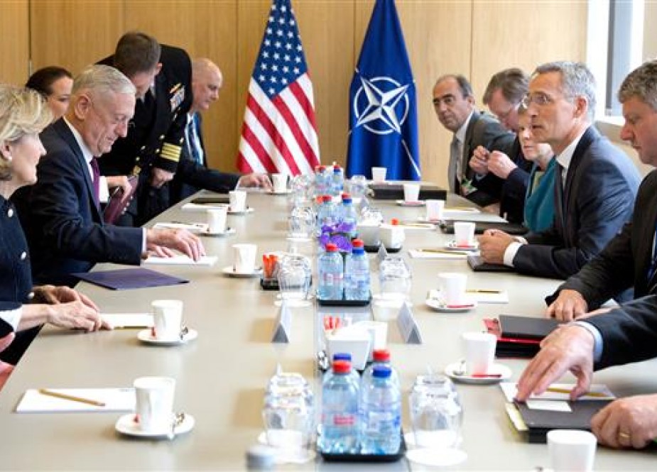 US Secretary for Defense James Mattis (3rd L) speaks with NATO Secretary General Jens Stoltenberg (3rd R) during a meeting at NATO headquarters in Brussels, on June 7, 2018. (Photo by AFP)