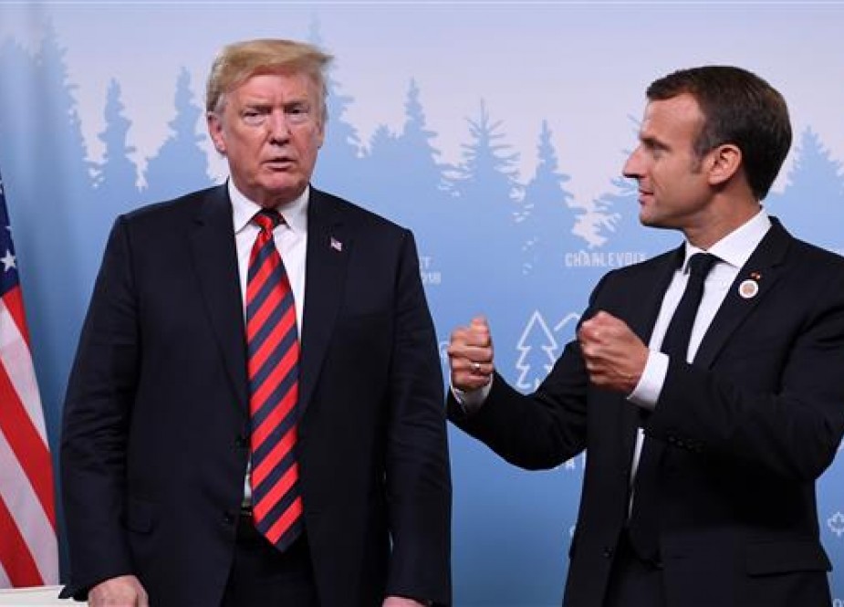 US President Donald Trump and French President Emmanuel Macron hold a meeting on the sidelines of the G7 Summit in in La Malbaie, Quebec, Canada, June 8, 2018. (Photo by AFP)
