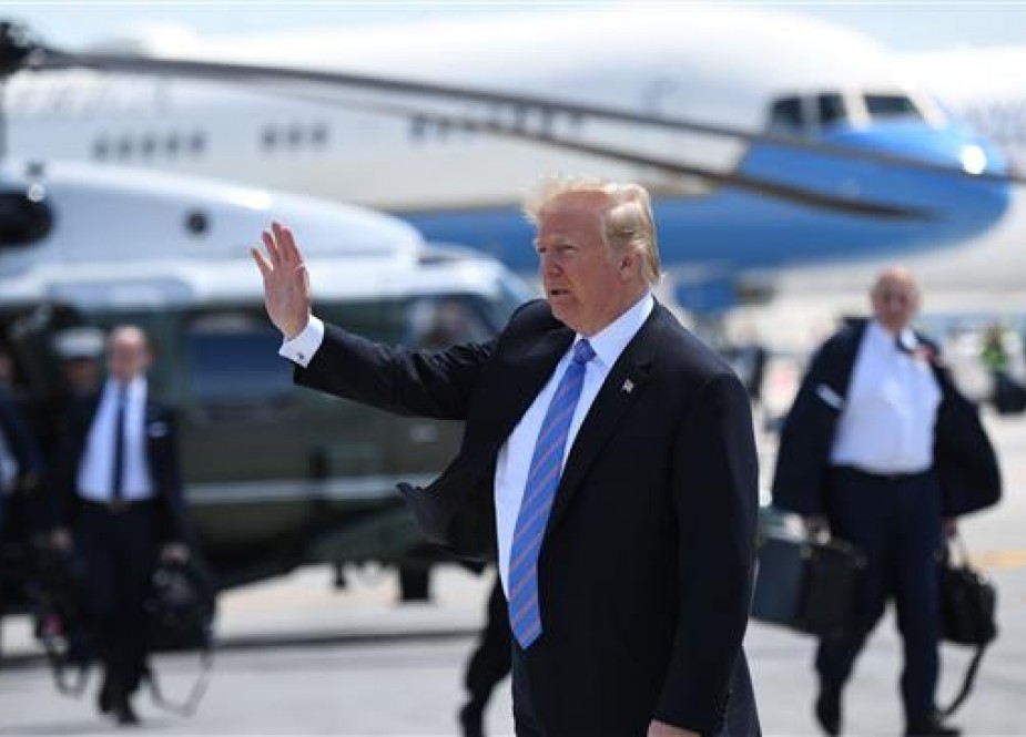 US President Donald Trump walks to Air Force One prior to departure from Canadian Forces Base Bagotville in Canada, June 9, 2018. Trump travels to Singapore to meet with North Korean leader Kim Jong Un on June 12. (Photo by AFP)