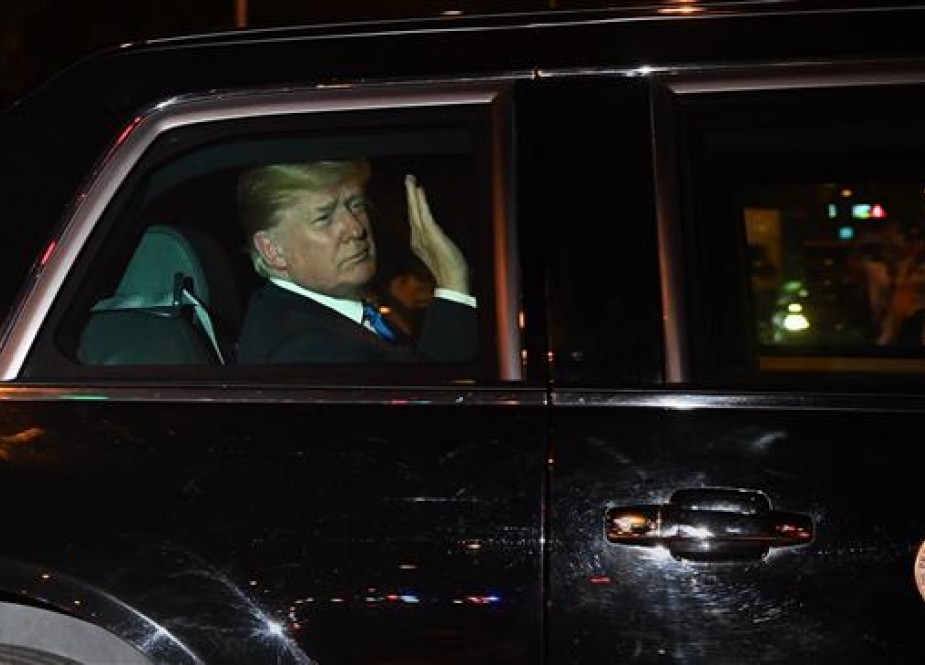 US President Donald Trump waves upon his arrival to his hotel in Singapore.jpg