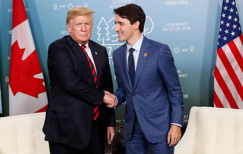 U.S. President Donald Trump shakes hands with Canada's Prime Minister Justin Trudeau in a bilateral meeting.