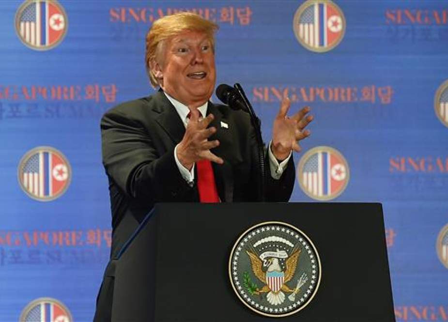 US President Donald Trump speaks at a press conference following the historic US-North Korea summit in Singapore on June 12, 2018. (AFP photo)