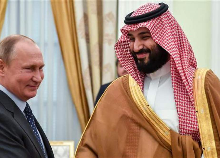 Russian President Vladimir Putin shakes hands with Saudi Crown Prince Mohammad bin Salman.jpg