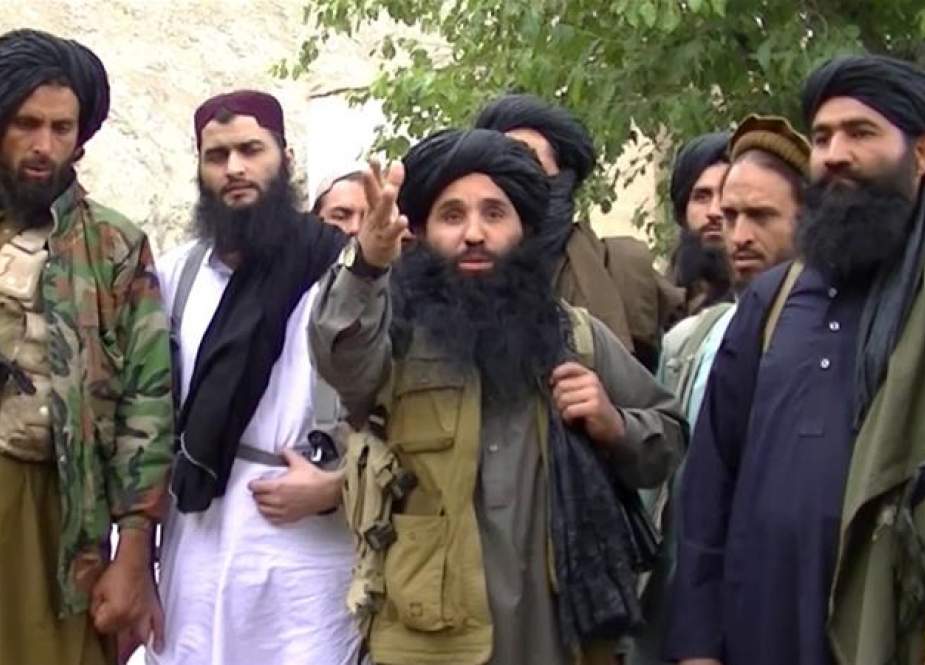 Fazlullah (center) became the Pakistani Taliban leader in November 2013 following the drone attack killing of Hakimullah Mehsud