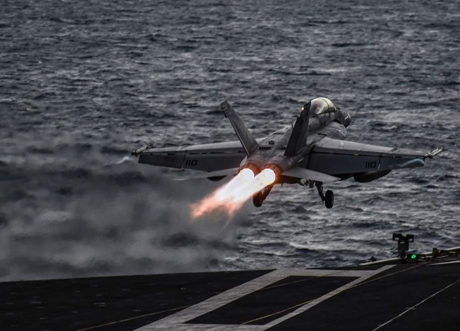An F18 Hornet fighter jet pilot takes off from the deck of the US navy aircraft carrier USS Harry S. Truman in the eastern Mediterranean Sea on May 8, 2018. (Photo by AFP)