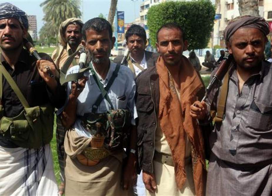 Yemen’s Houthi fighters are seen during a gathering to mobilize more fighters to the battlefront to fight pro-government forces, in the Red Sea port city of Hudaydah on June 18, 2018. (Photo by AFP)