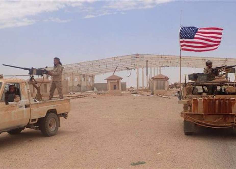 US-backed Takfiri militant mans a heavy automatic machine gun.jpg