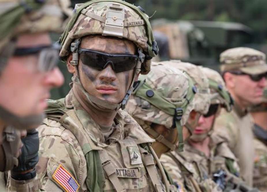 In this file photo taken on June 16, 2017 American Soldiers are seen during NATO Saber Strike military exercises in Orzysz, Poland. (Photo by AFP)