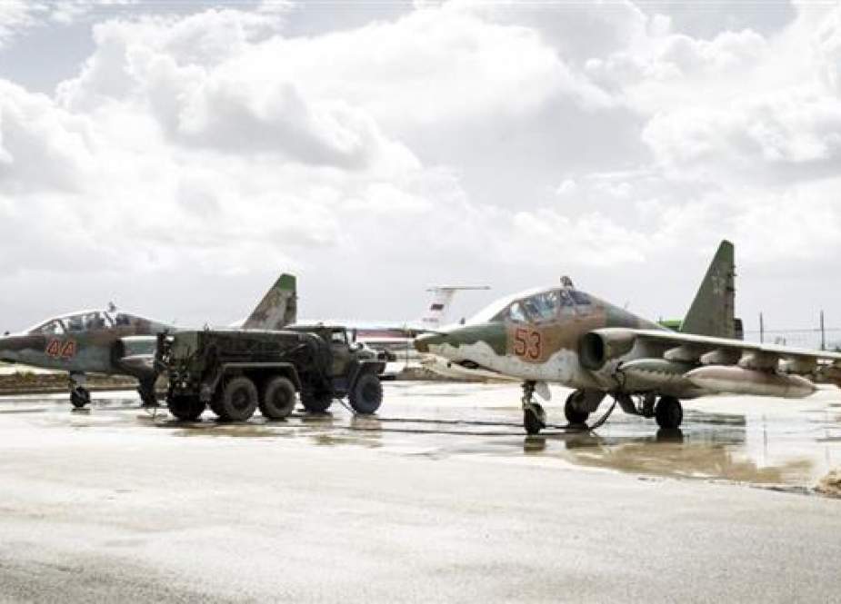 Russian Sukhoi Su-25 fighter jets are shown shortly before takeoff at Hmeimim air base in Syria. (Photo by Reuters)