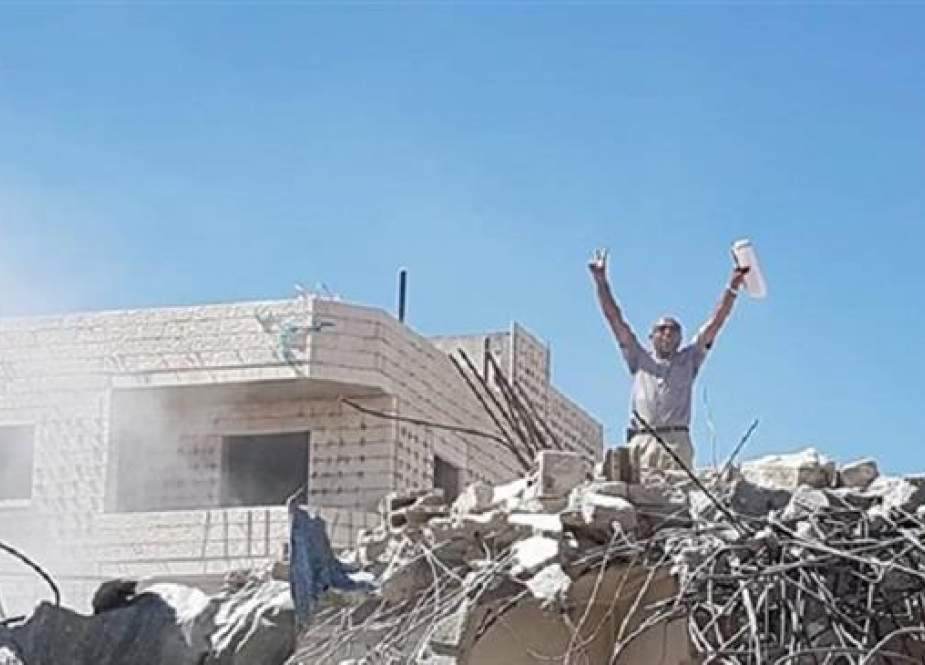 Palestinian families demolish their own homes in East Jerusalem al-Quds.jpg