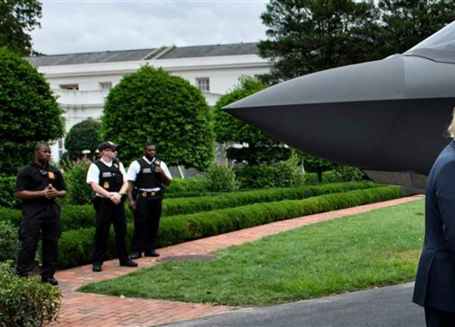 US President Donald Trump stands with an F-35 on the South Lawn of the White House during an event to showcase American made products at the White House July 23, 2018 in Washington, DC. (AFP photo)