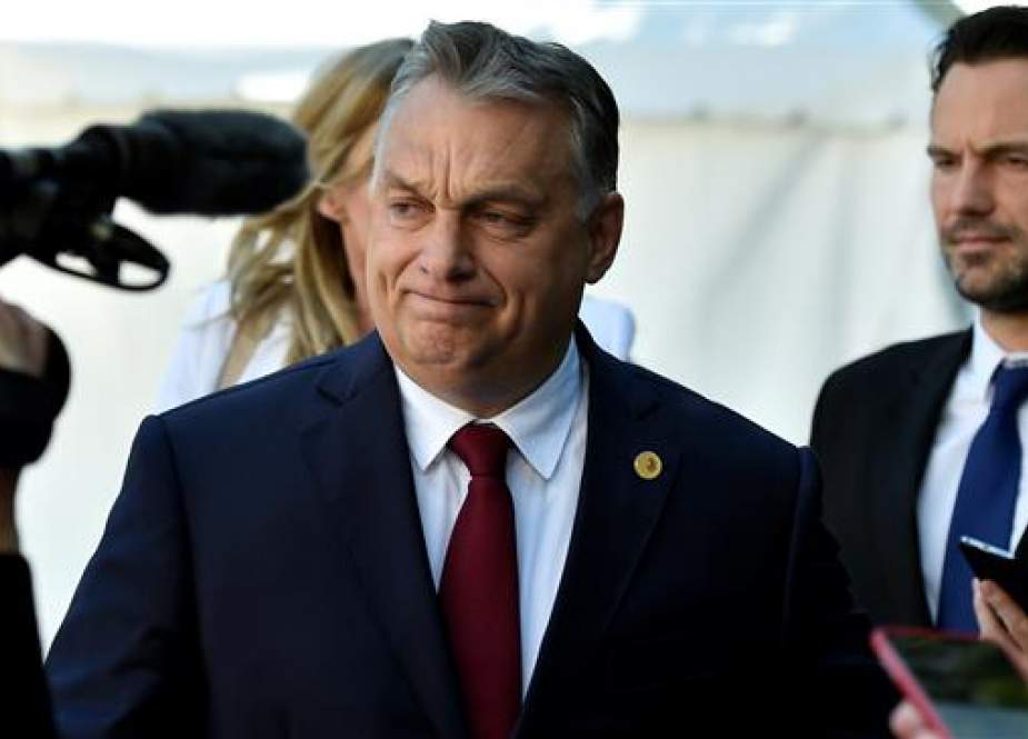 Hungarian Prime Minister Victor Orban arrives at a European People