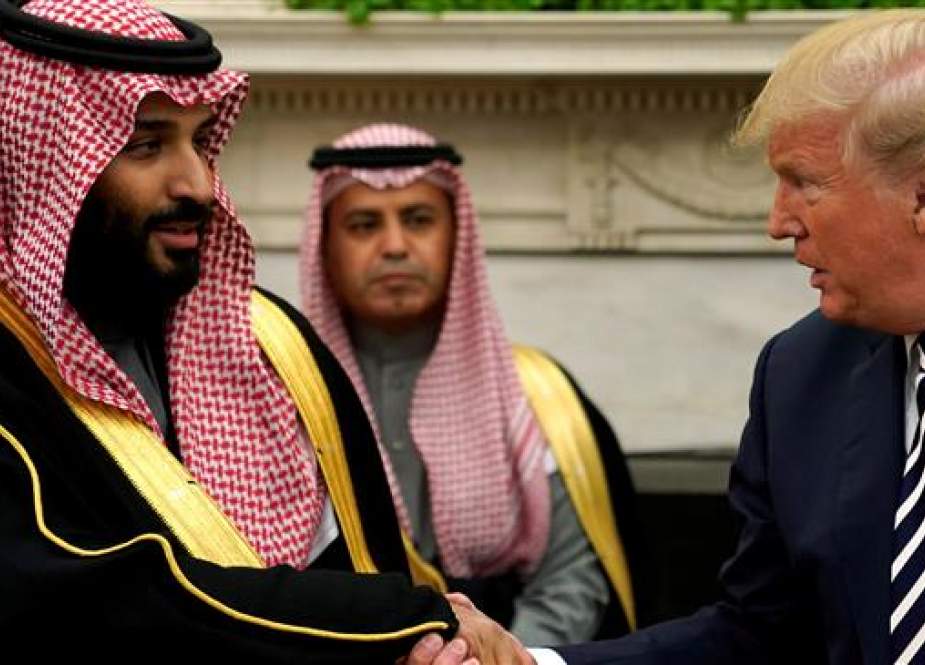 US President Donald Trump (R) shakes hands with Saudi Arabia