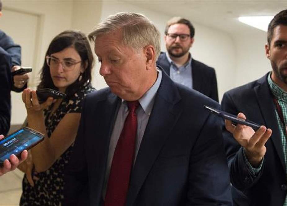 US Senator Lindsey Graham is surrounded by reporters on July 17, 2018 on Capitol Hill in Washington, DC. (AFP photo)